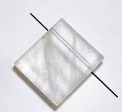 Light is split on refraction by some chrystals