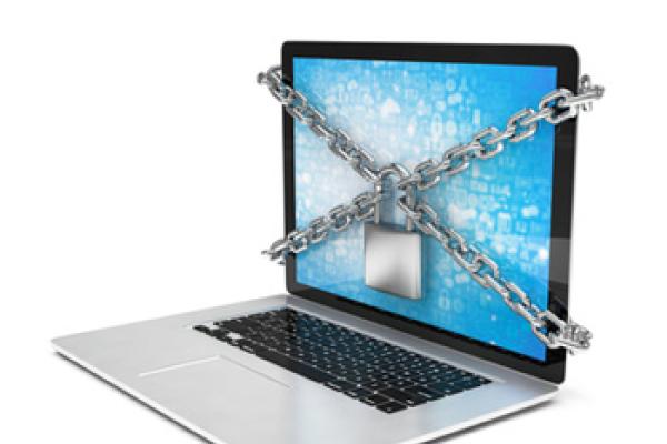 Laptop secured by a padlock - image purchased from Fotalia