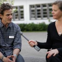 Person interviewing another person