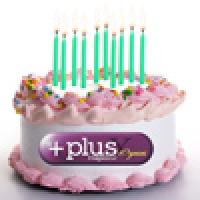 Birthday cake with candles and a plus logo photoshopped onto the cake